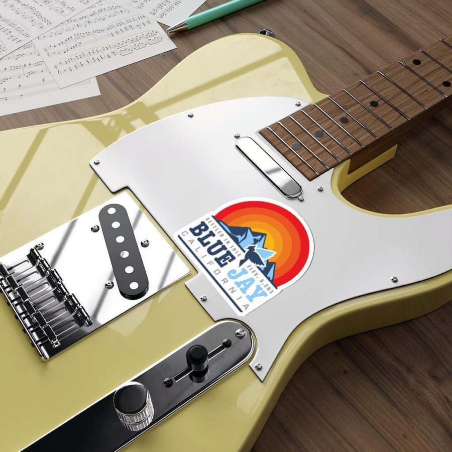 Blue Jay CA Die-Cut Sticker Decal with our Sunset, Mountain Peaks, and Blue Jay Design on a Guitar