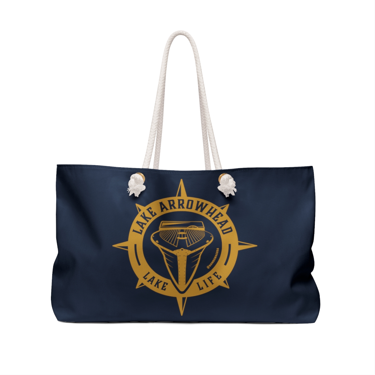 weekender bag with our exclusive woody boat artwork in gold on navy blue