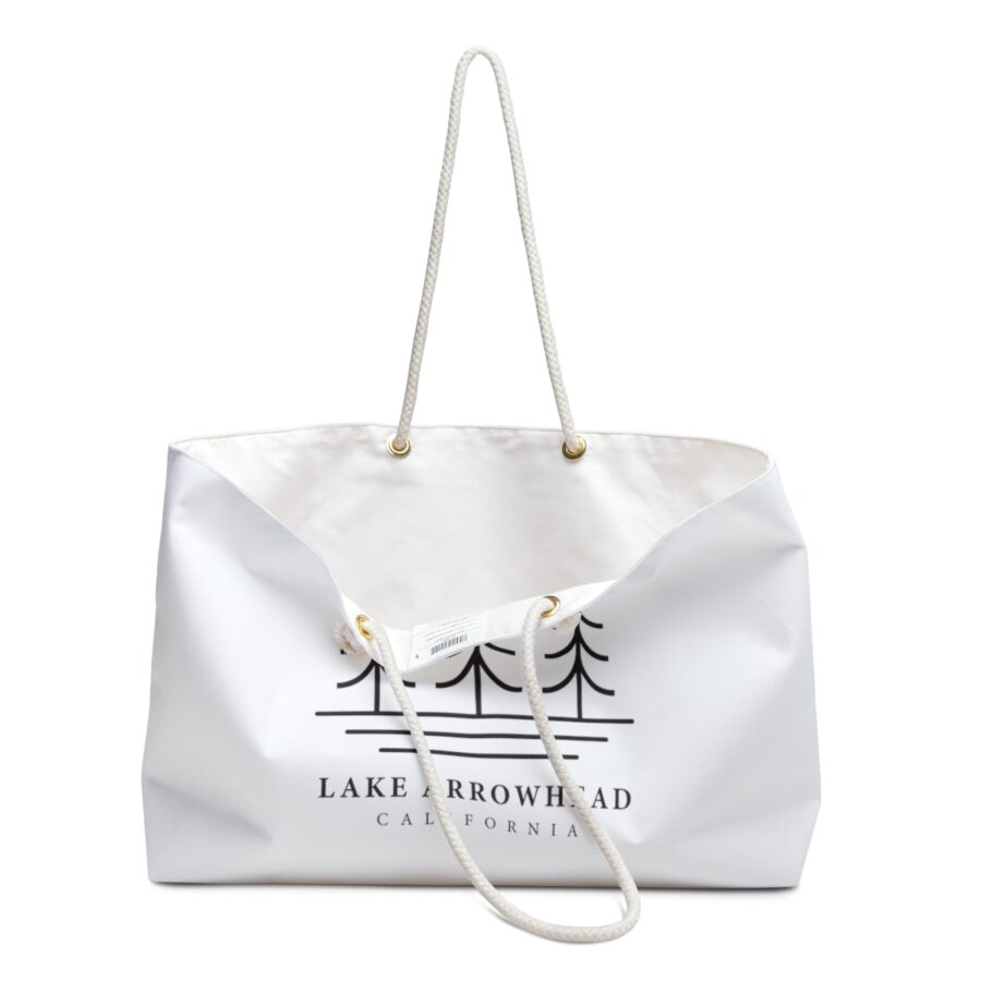 lake arrowhead weekender tote bag with our three tree and water line art