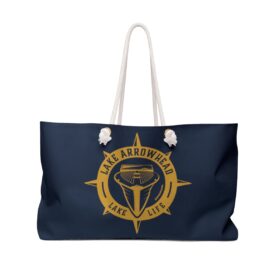 weekender bag with our exclusive woody boat artwork in gold on navy blue